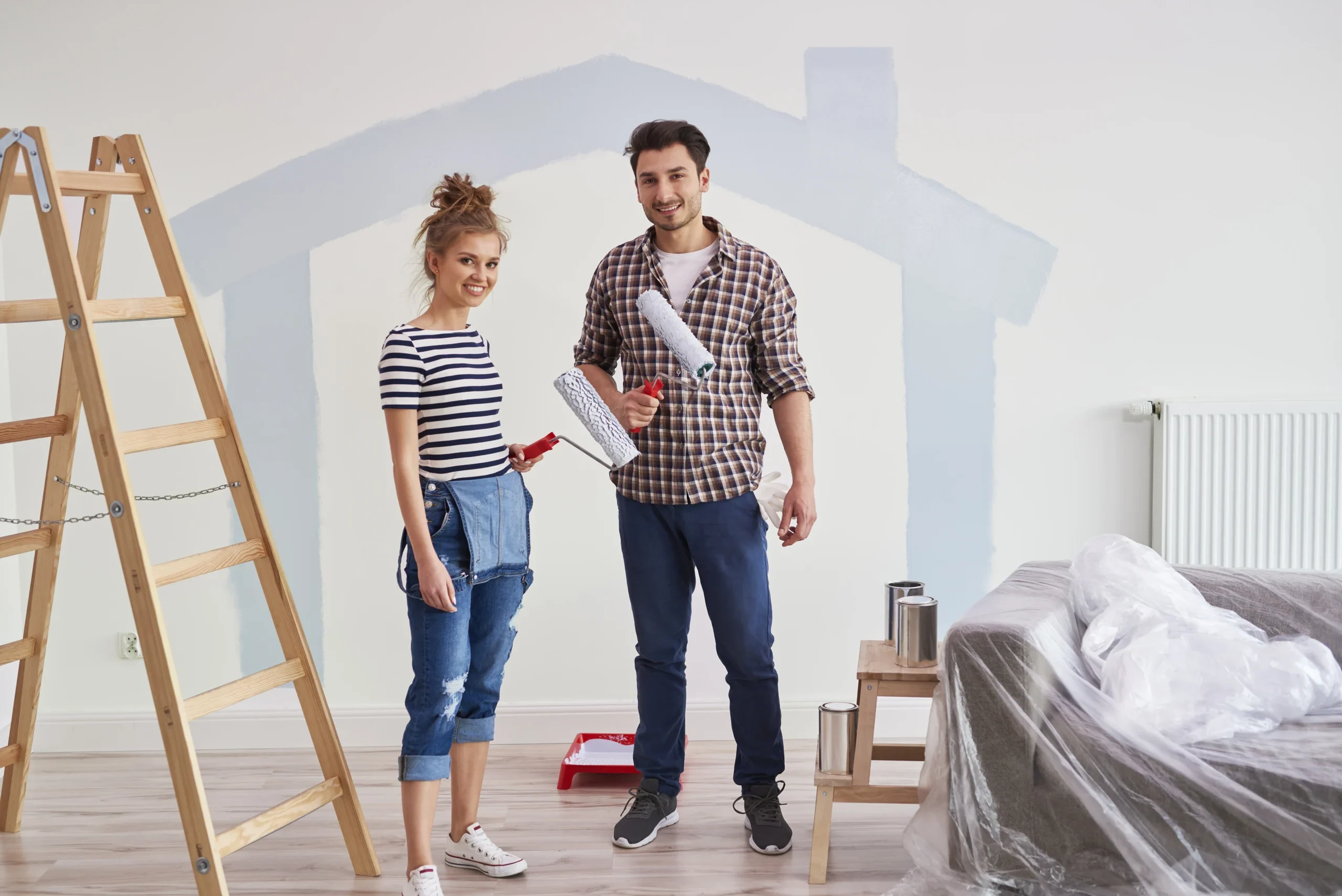 Couple Painting Interior Walls